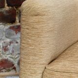 Fauteuil en velour beige et franges