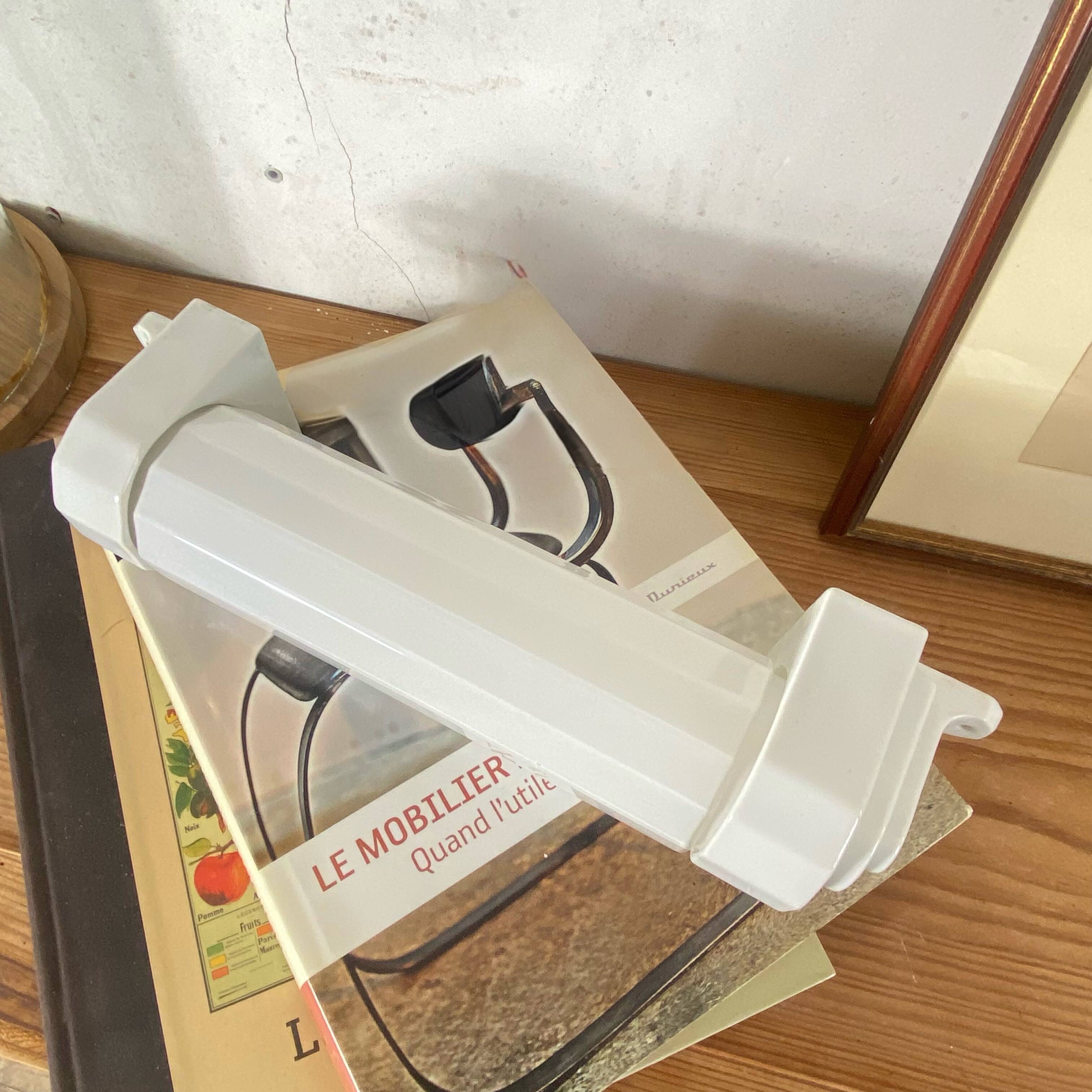 Art Deco tubular wall light in ceramic and white opaline glass tube.