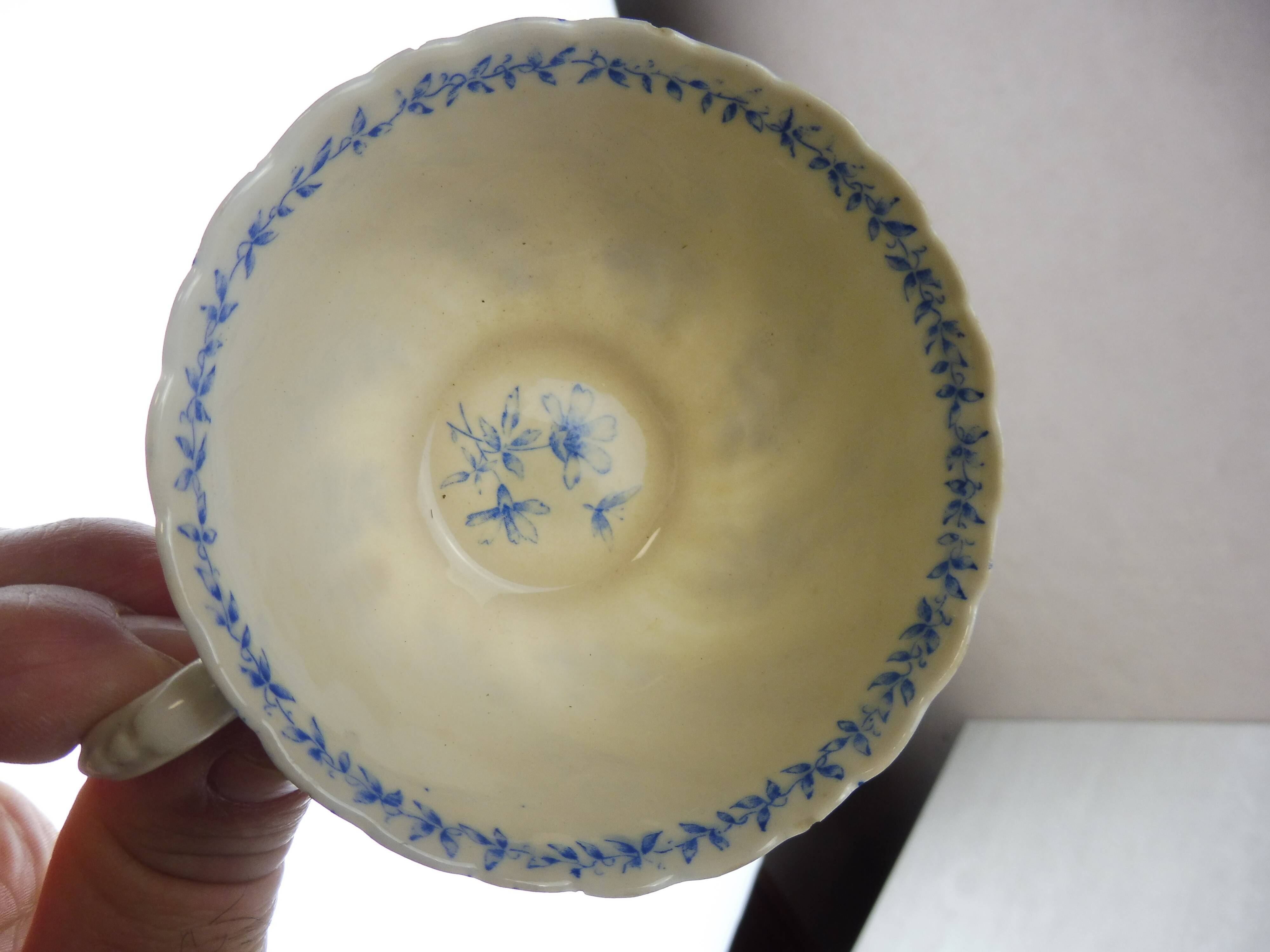 Lot of porcelain cups and under cups, twisted decoration, from Sarreguemines