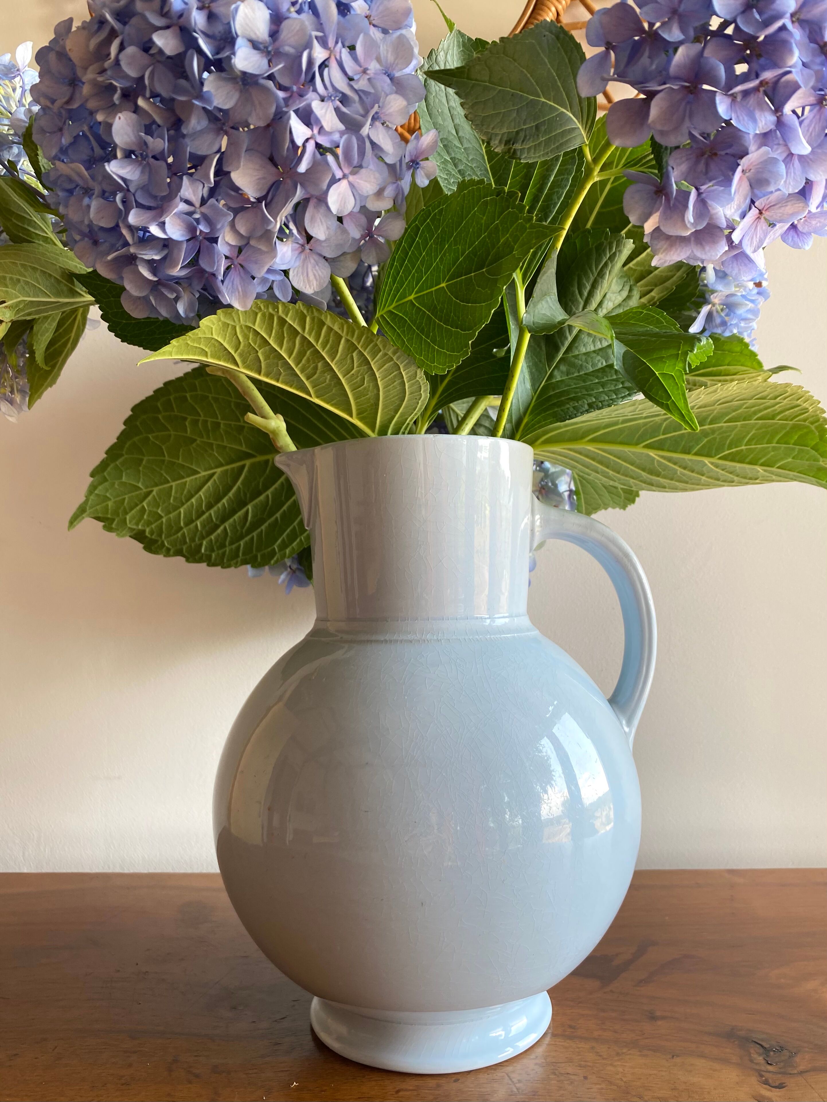 Antique vase in pale blue ceramic