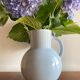 Antique vase in pale blue ceramic