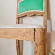 Renovated antique chair – carved wood and green backrest