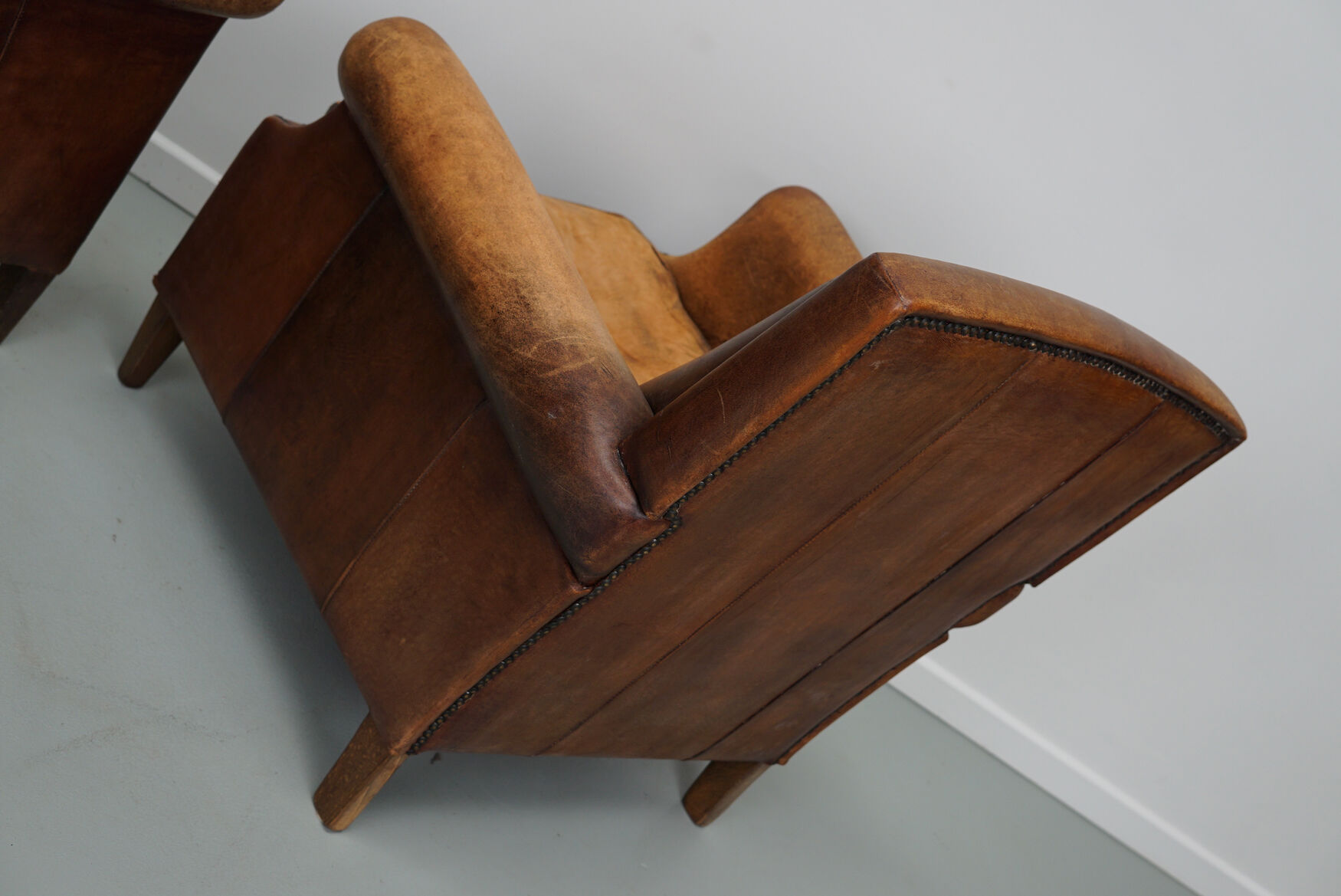 Vintage dutch cognac colored leather club chairs