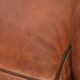 Sheepskin 2-seater sofa with a warm cognac brown colour scheme