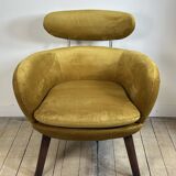 Mustard yellow velvet armchair from the 2010s.