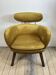 Mustard yellow velvet armchair from the 2010s.