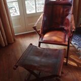 Leather folding armchair and footwork