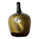 Dame jeanne ancienne en verre martelé