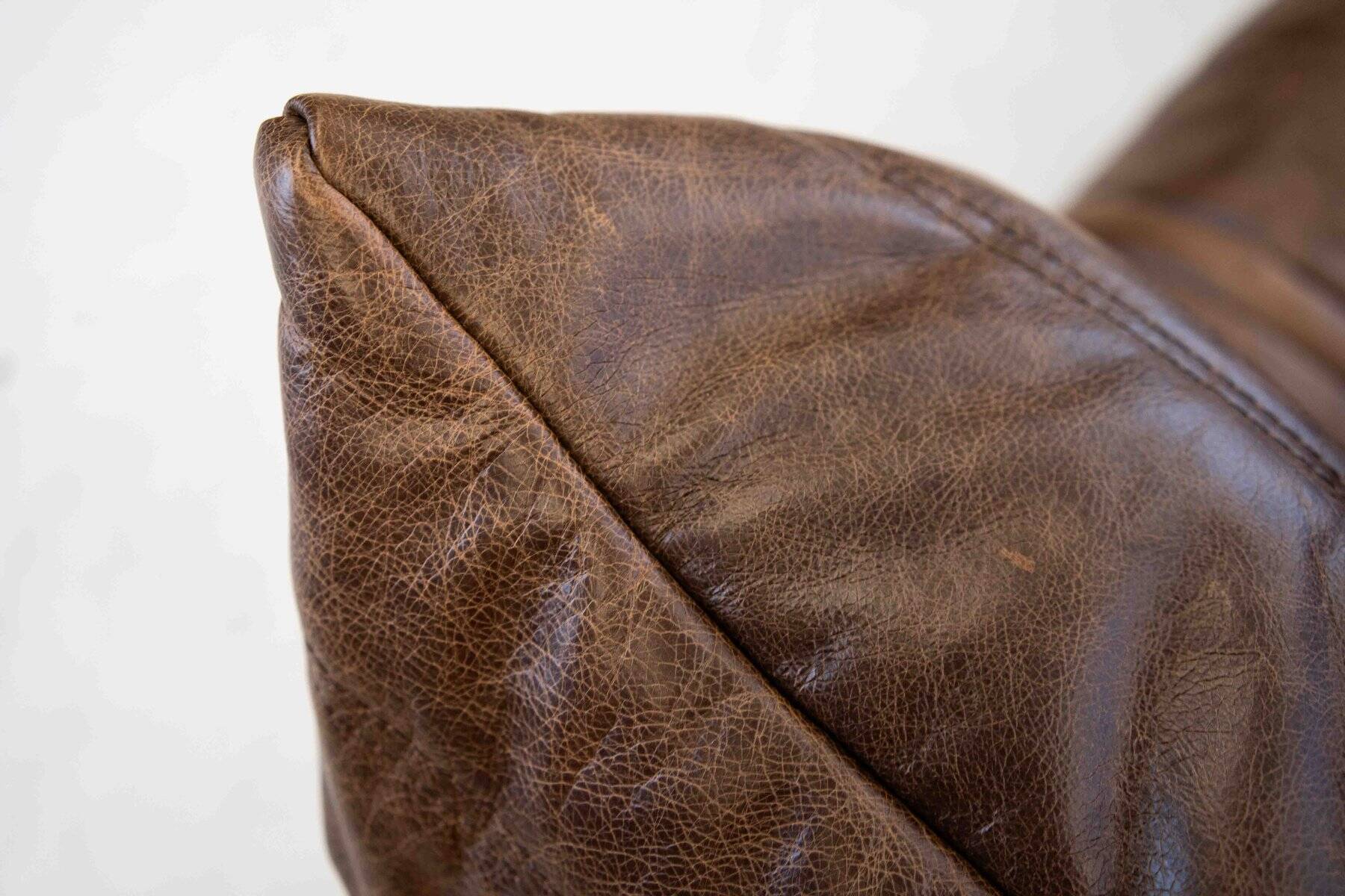 Vintage two-seater Togo sofa with arms in brown leather by Michel Ducaroy for Ligne Roset, 1970s