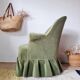 Green velvet armchair