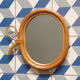 Miroir rotin vintage en forme de pomme