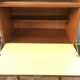 Vintage secretary with wooden compass feet with felling, shop window and closet