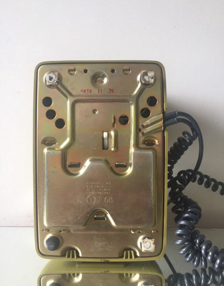 Vintage mustard green rotary telephone