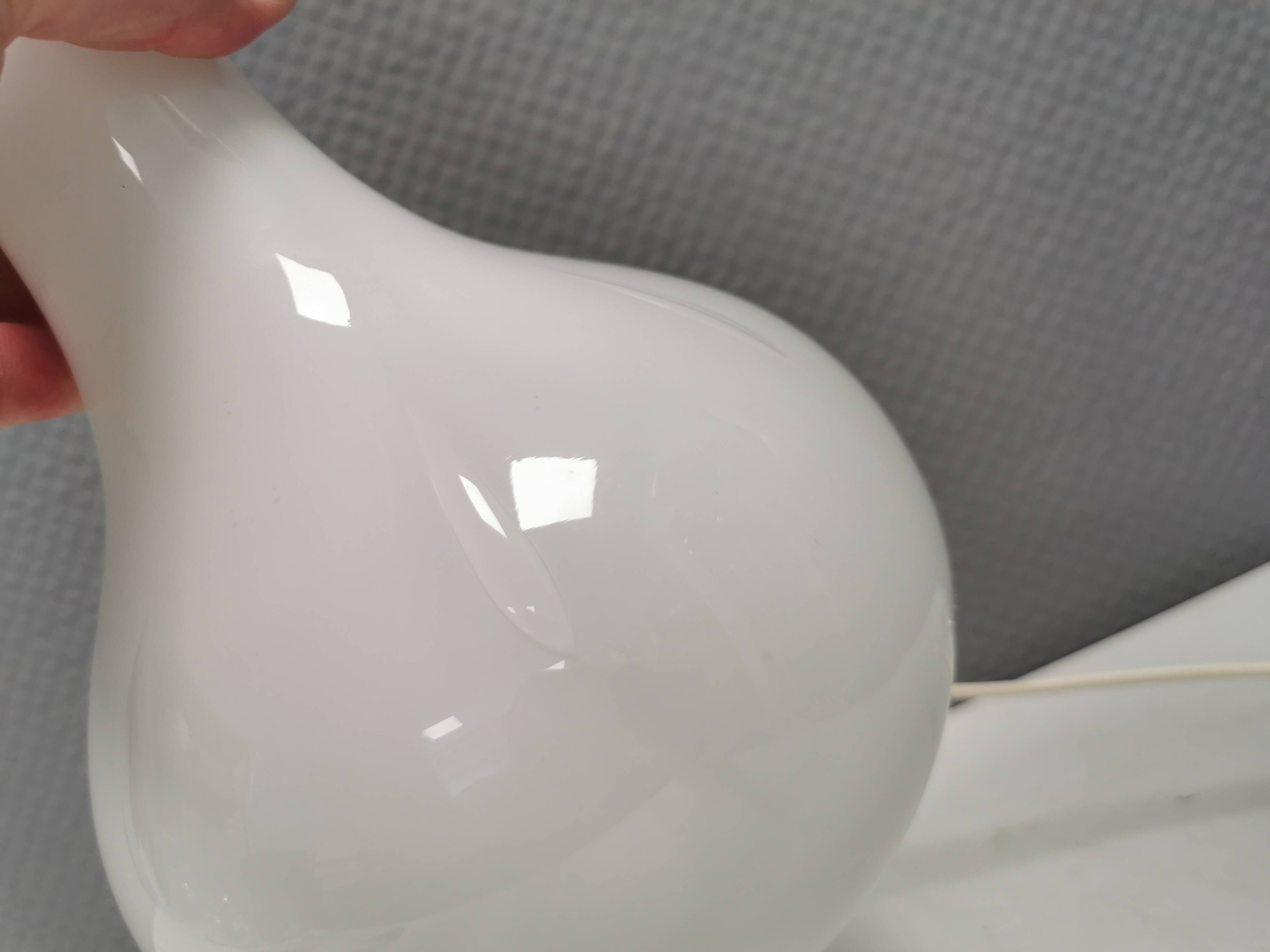 Helios table lamp, teardrop shaped, made of white opal glass. 1986 Denmark