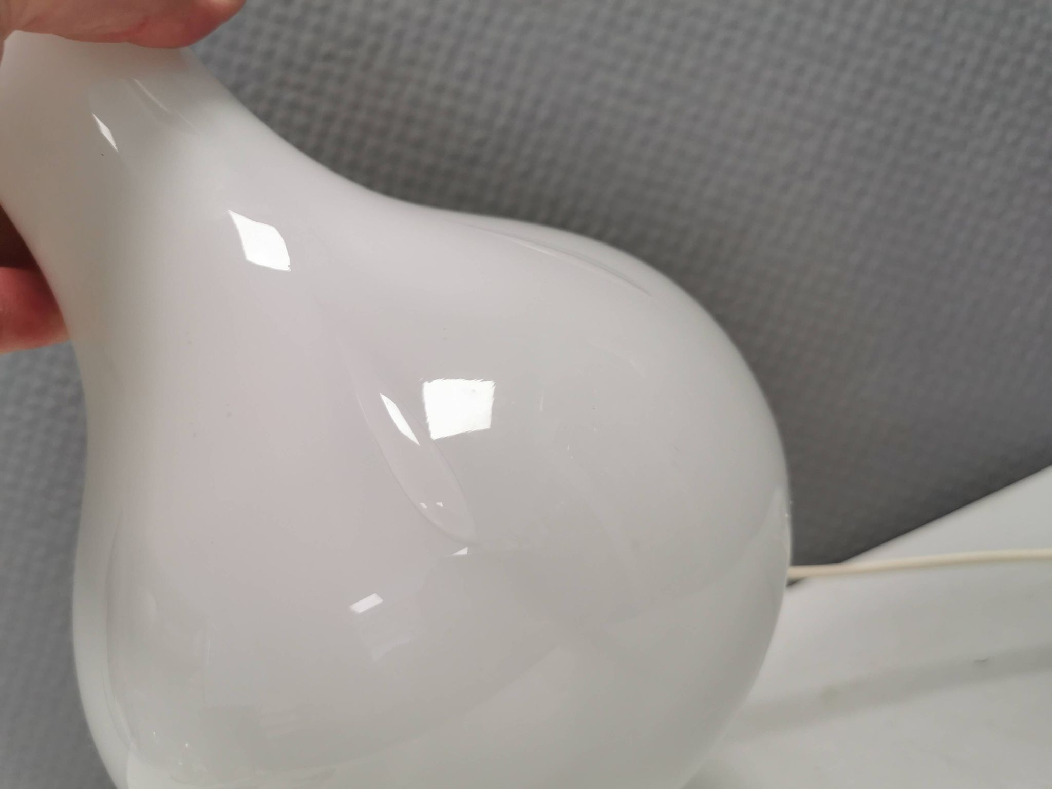 Helios table lamp, teardrop shaped, made of white opal glass. 1986 Denmark