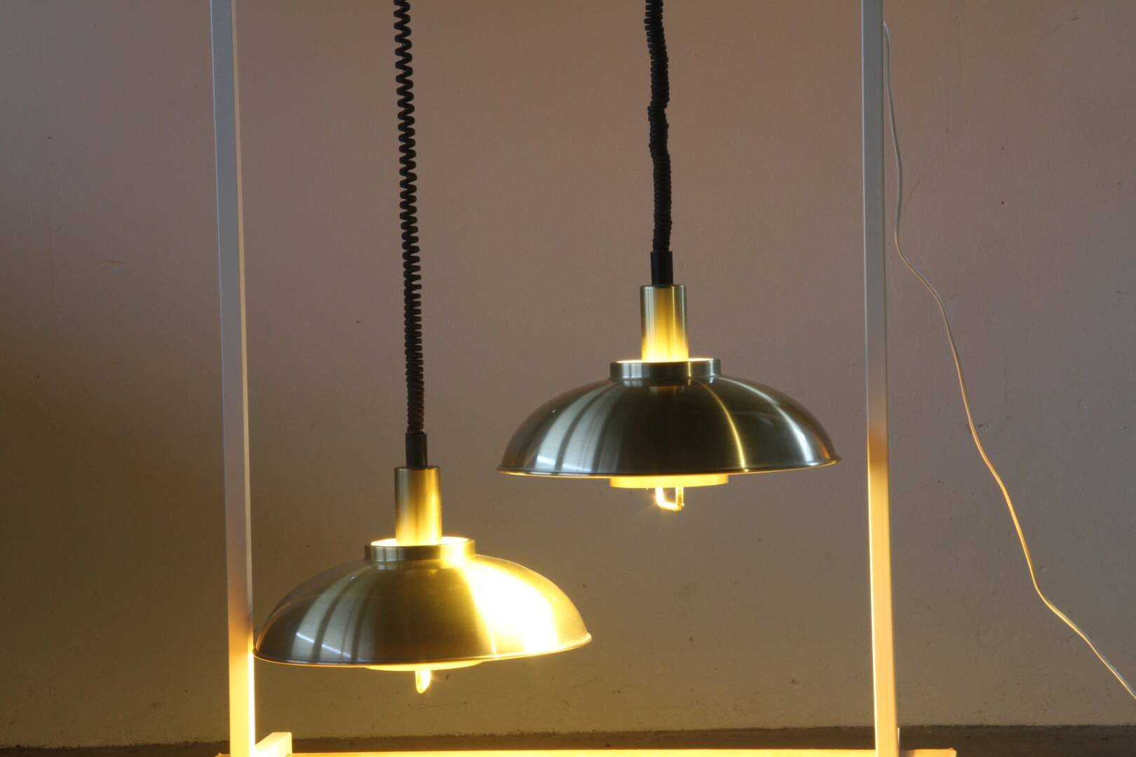 Danish pair of brass colour ceiling lamps attributed to the company Frandsen 1