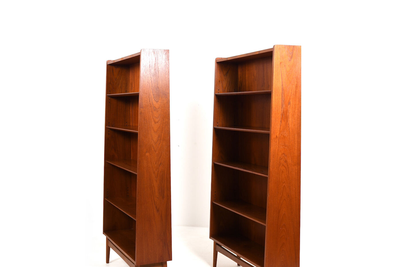 Pair conical Danish Bookcases in Teak by Johannes Sorth