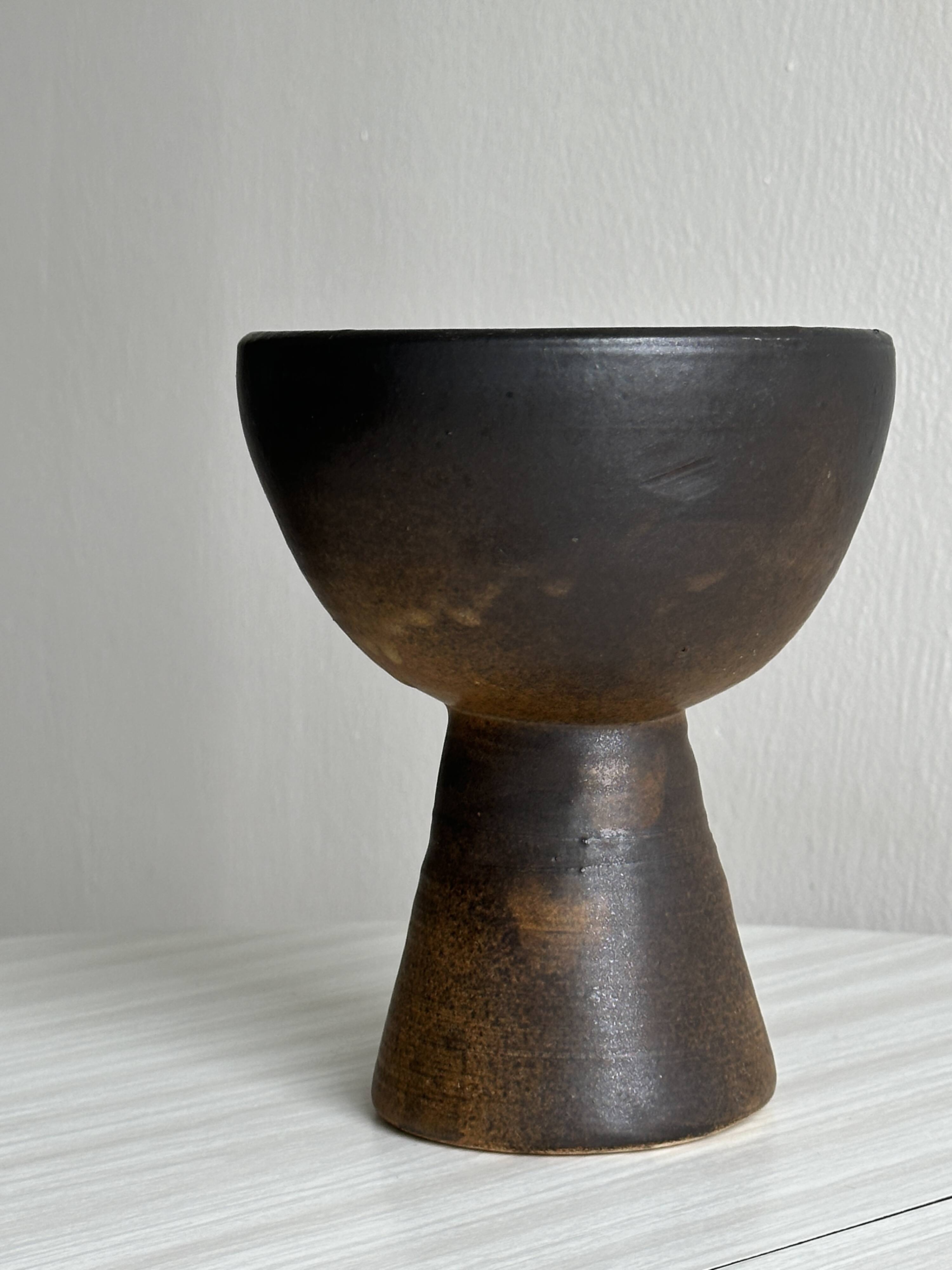 Dark brown raw ceramic cup