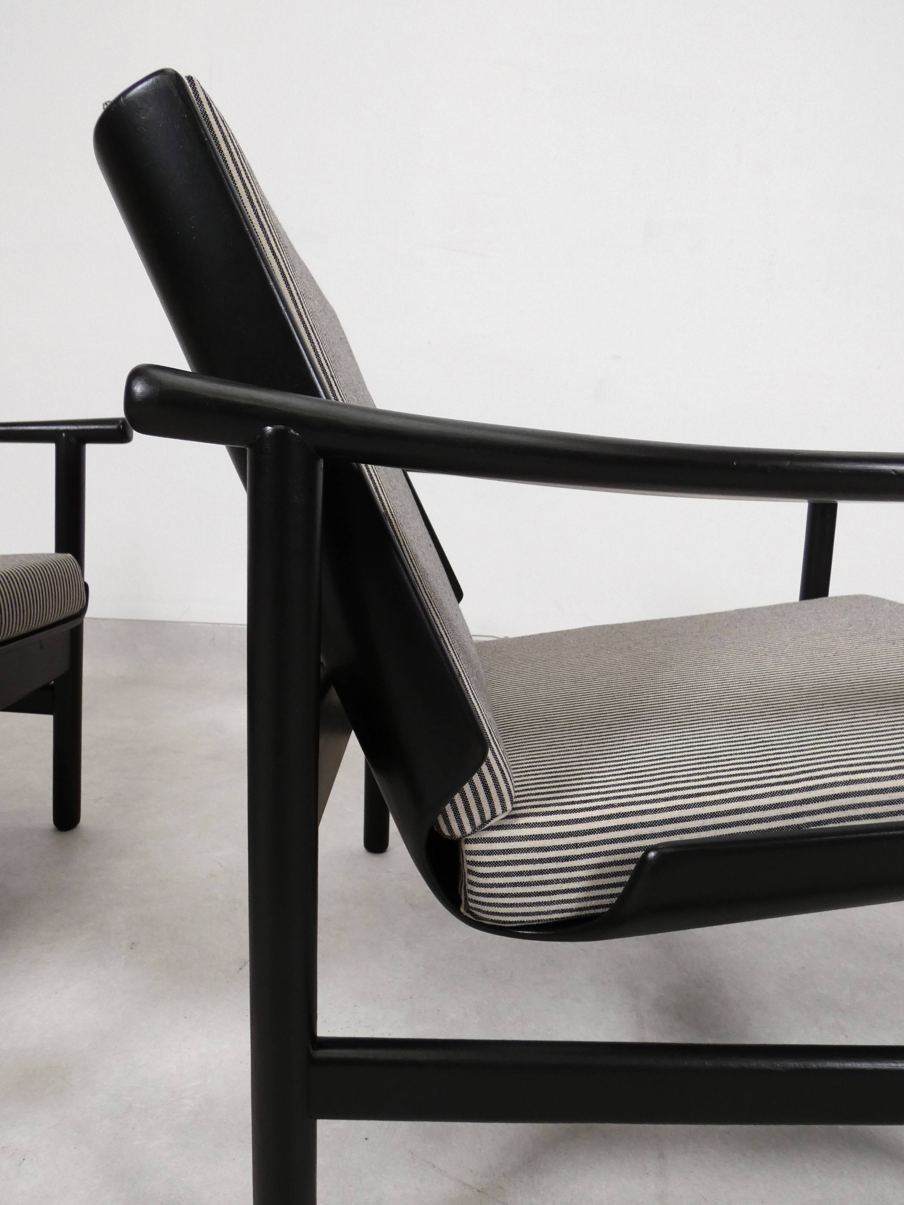 2x wooden Scandinavian arm chairs