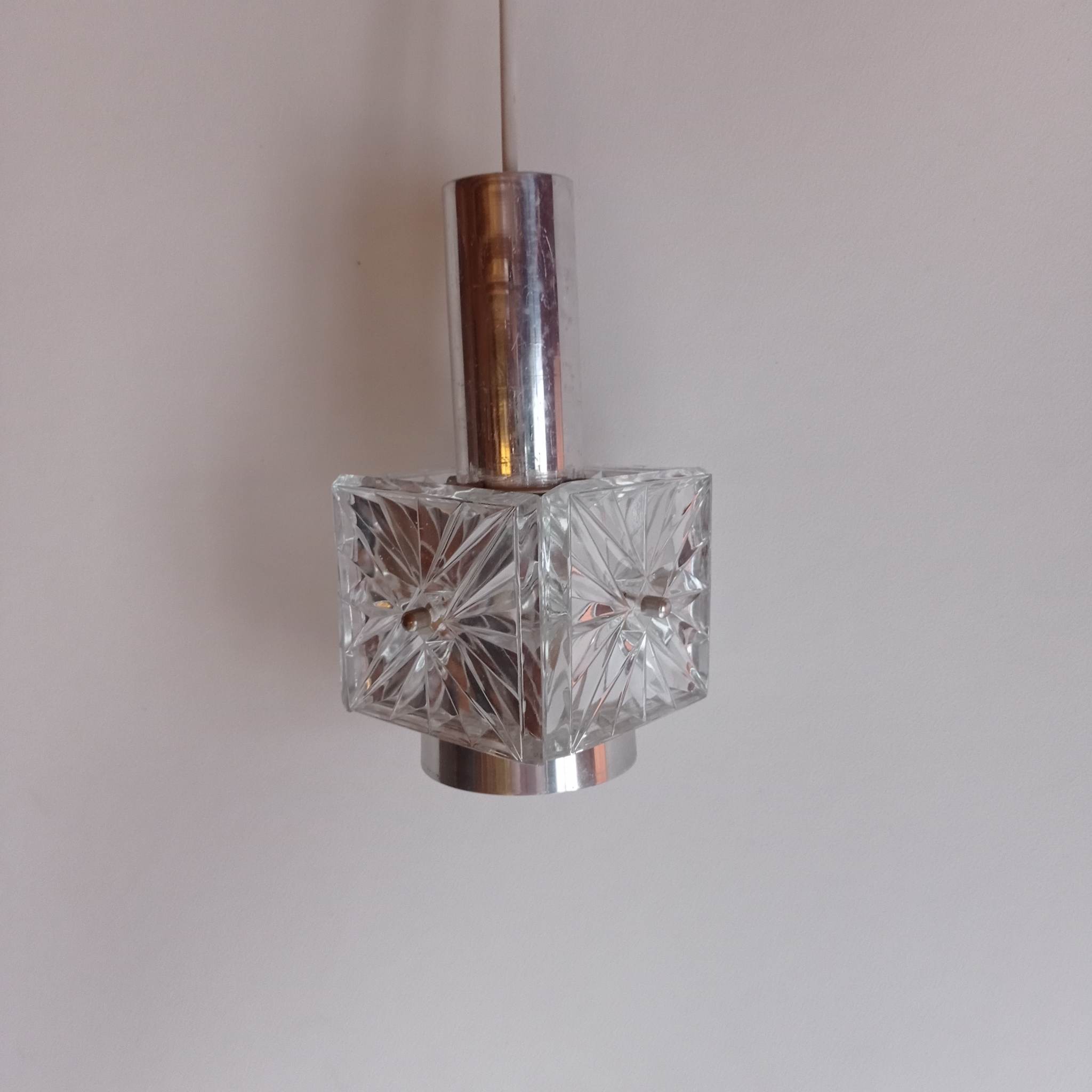 A set of four Kinkeldey pendant lamps from the 70