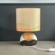 Ceramic floor lamp with a silk shade, signed.