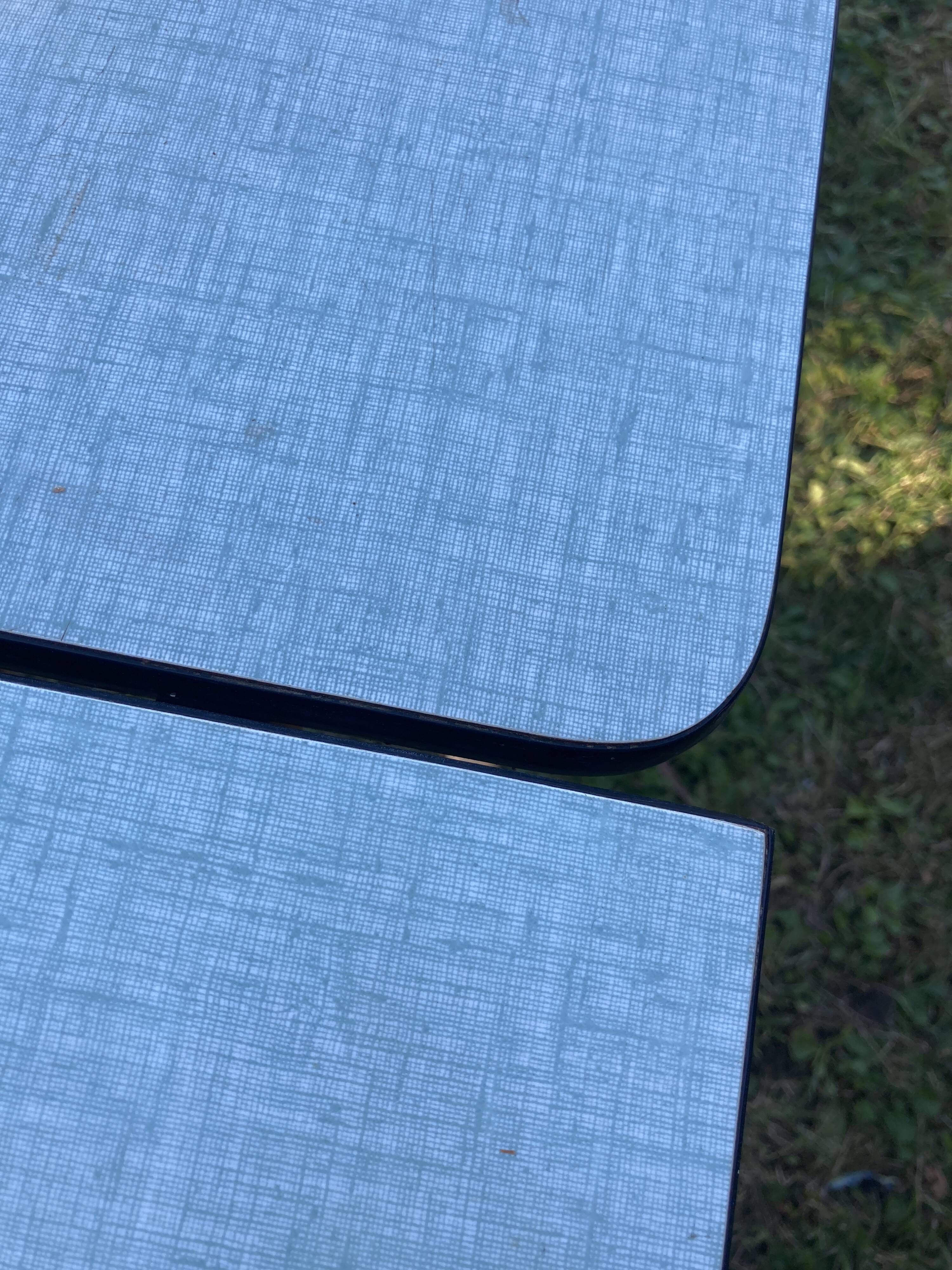 Blue formica table with extensions