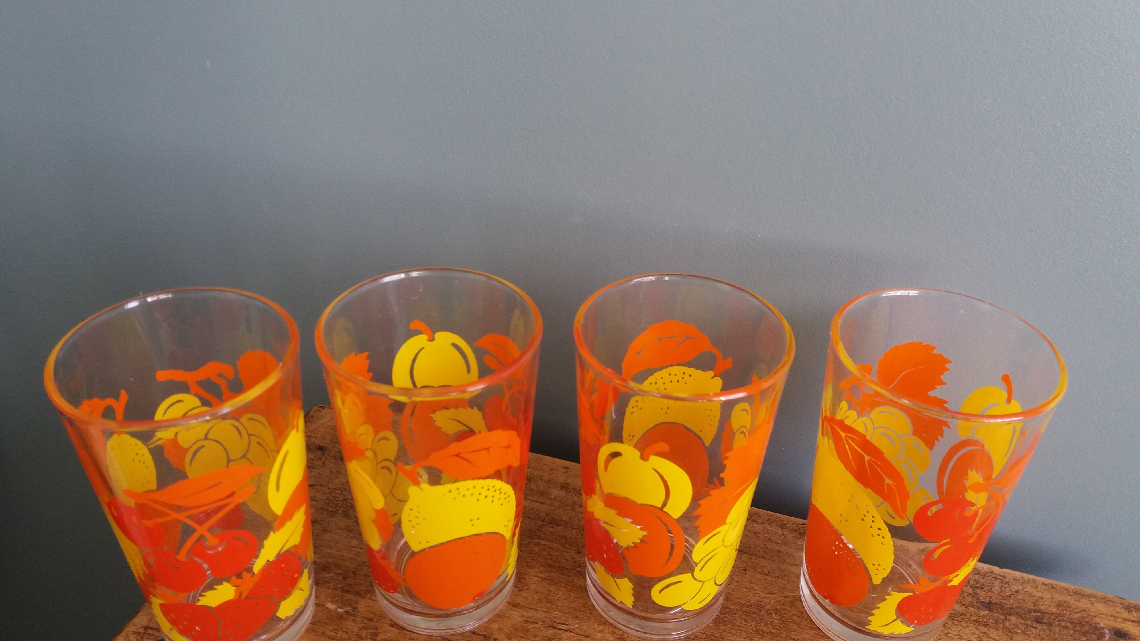 Verres vintage décorated with orange and yellow lemon fruits, Italy.