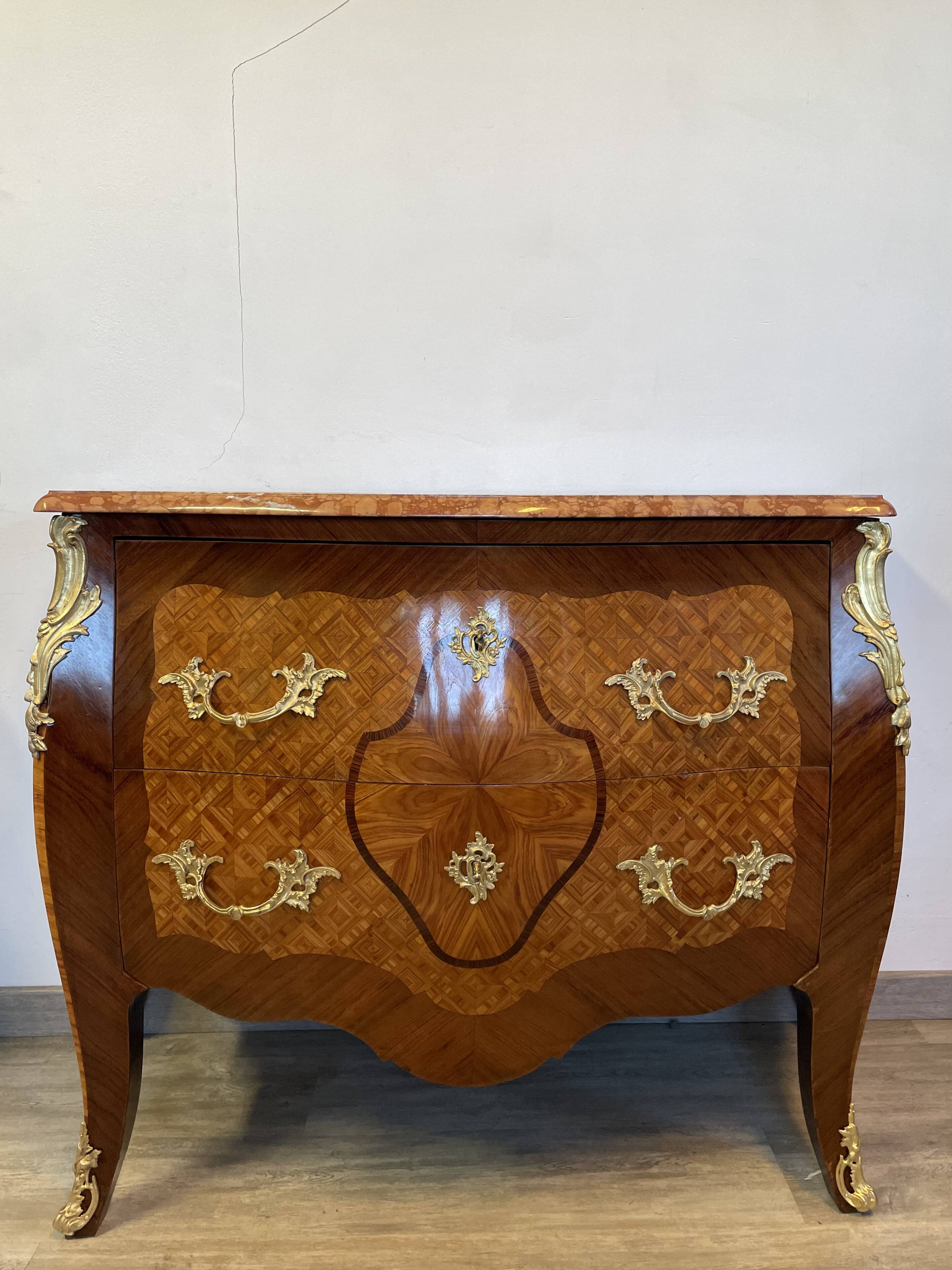 Louis XV chest of drawers in rosewood