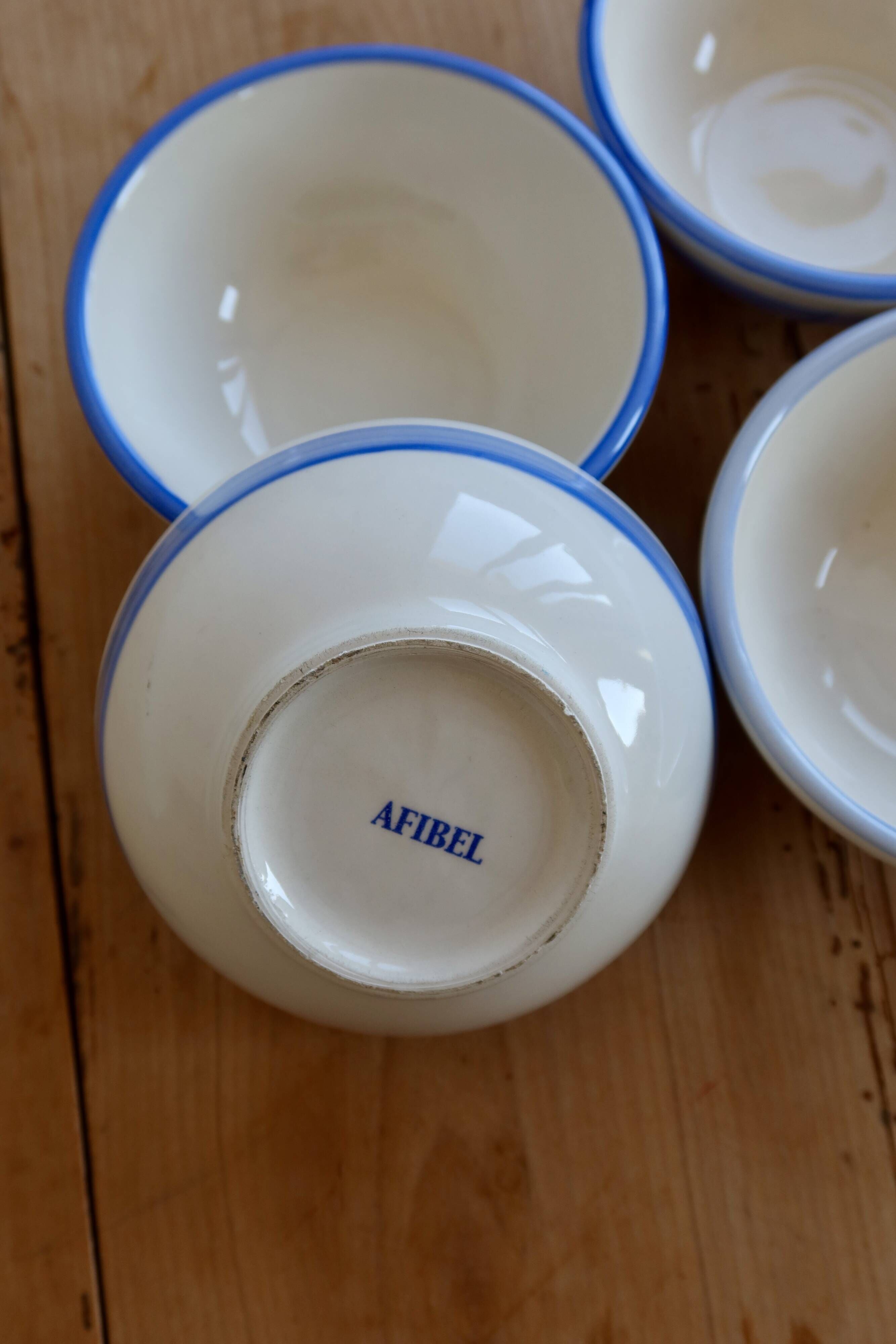 4 vintage striped ivory and blue earthenware bowls by Afibel