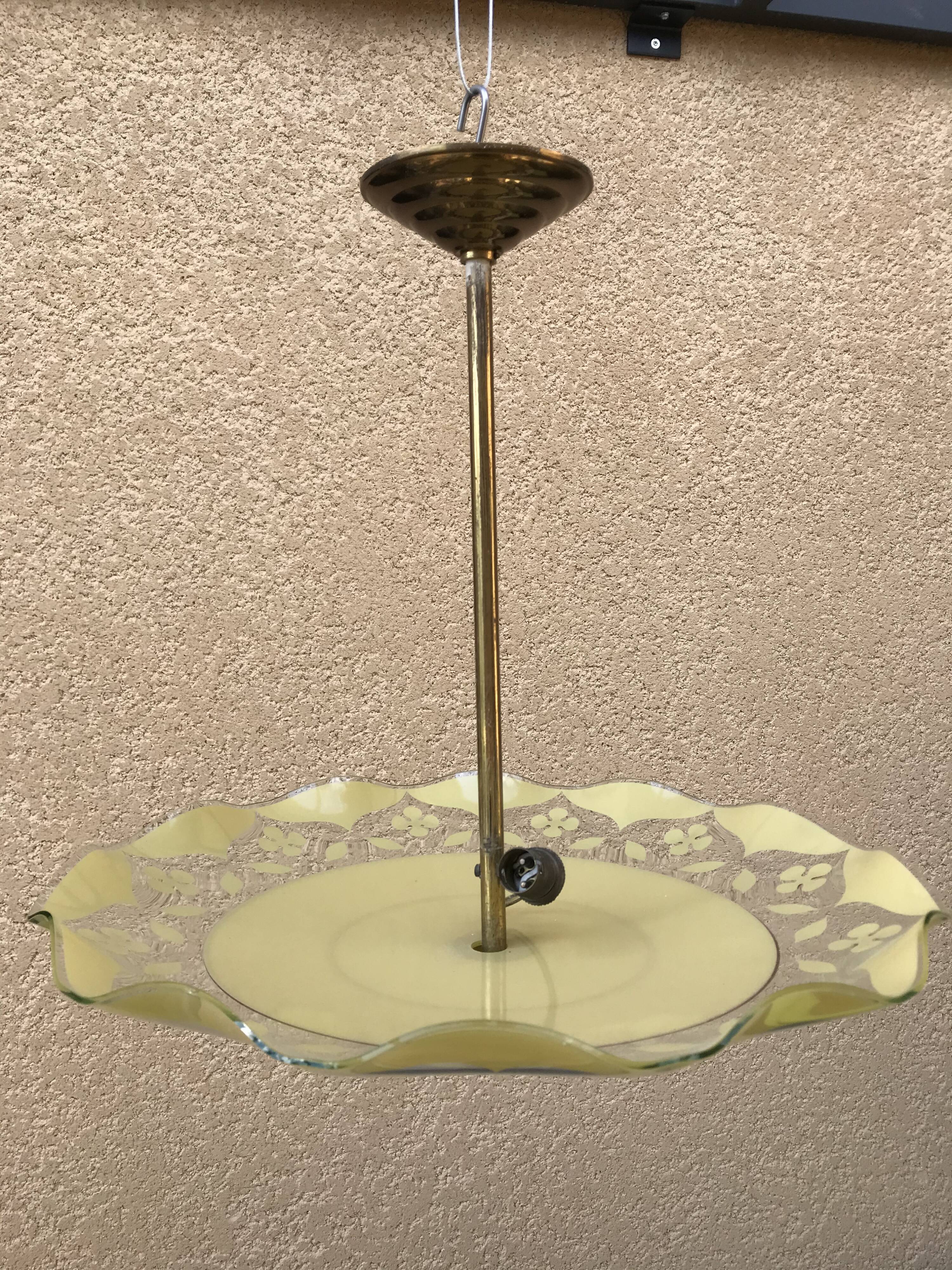 Brass and yellow glass hanging lamp
