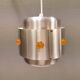 Two Space-Age hanging lamps, in silver-coloured aluminium with orange prisms.