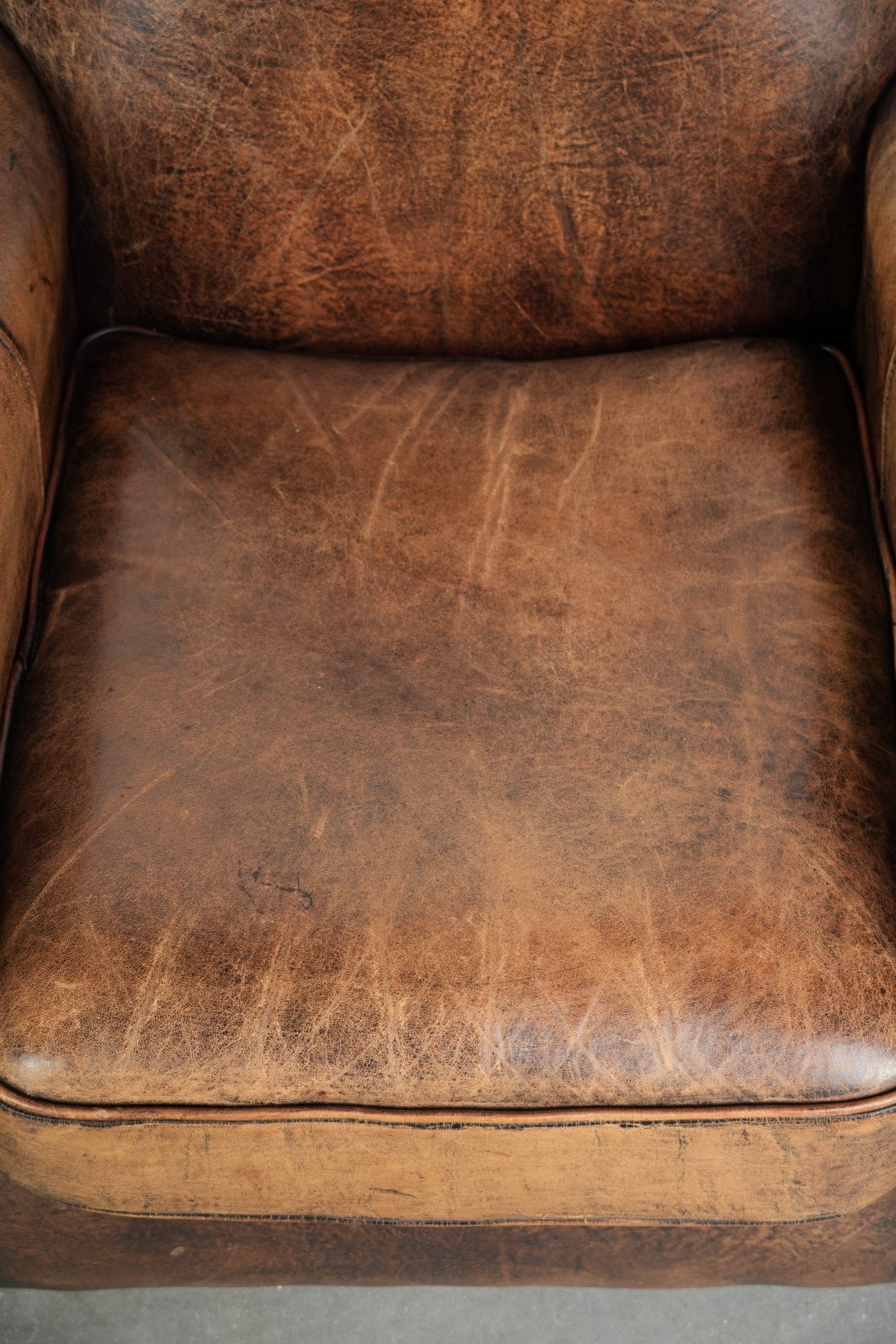 Armchair made of sheepskin leather in Art Deco design with beautiful patina