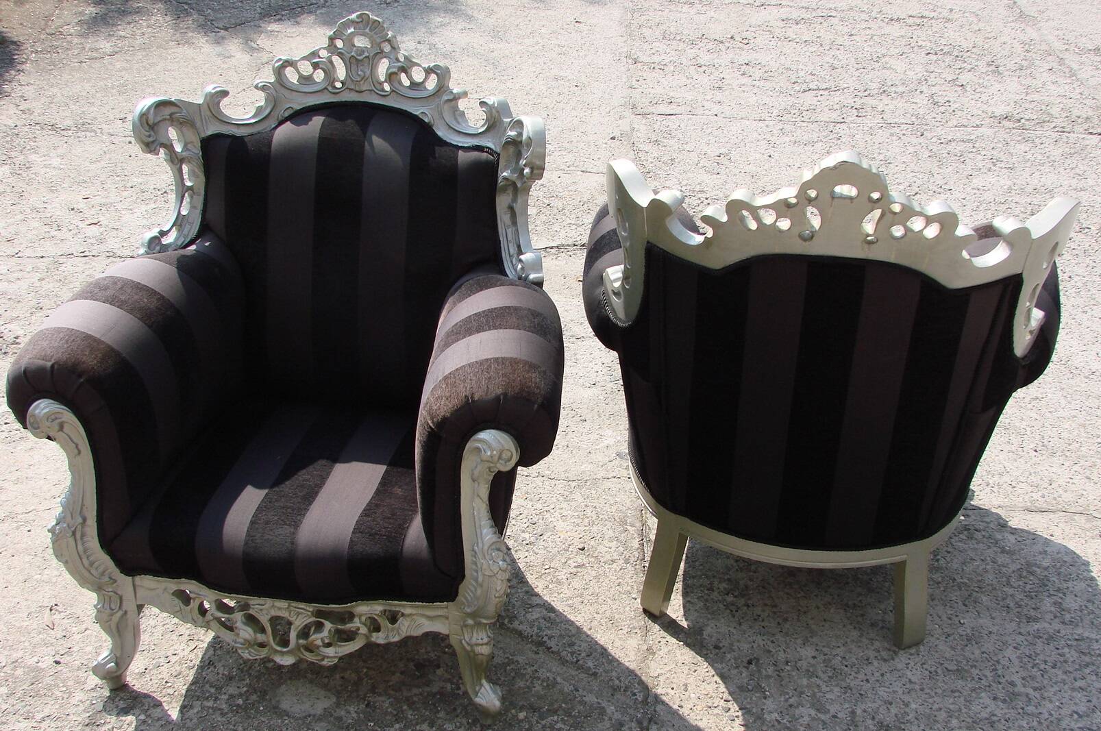 A pair of vintage armchairs, 1980s, lacquered wood and fabric