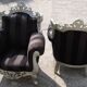 A pair of vintage armchairs, 1980s, lacquered wood and fabric