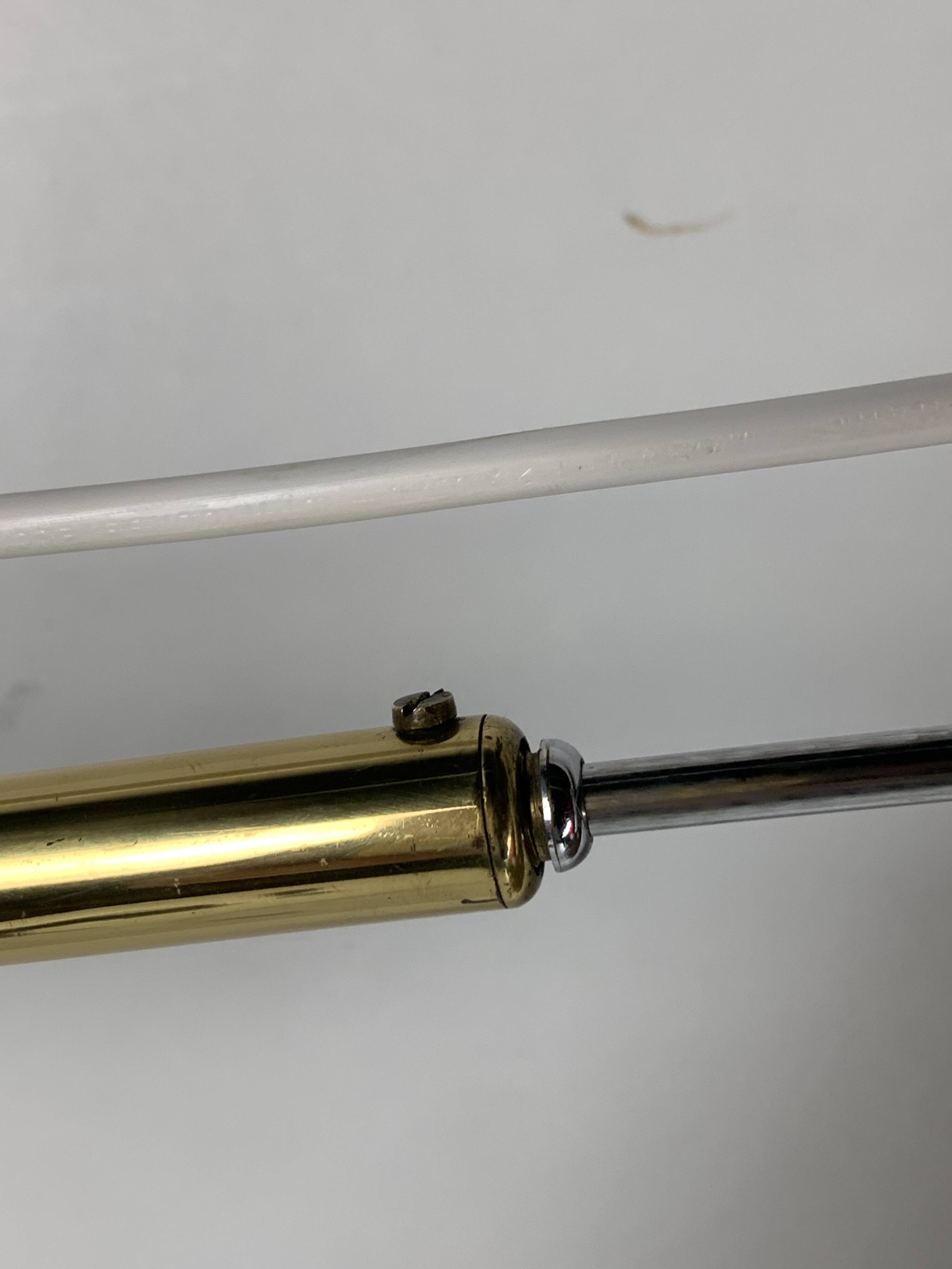 Midcentury extendable brass wall mount with cocoon and sisal shade Lars Schioler, 1960s