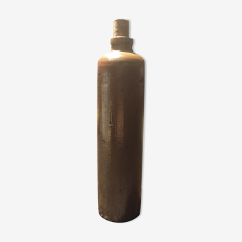 Chocolate-colored stoneware bottle with cork stopper