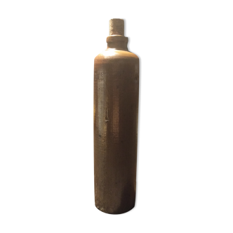 Chocolate-colored stoneware bottle with cork stopper