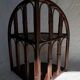 Corner shelf in dark rattan, 60s/70s