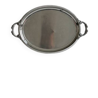 Large stainless steel serving platter with fish-shaped handles.