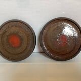 Pair of red speckled ceramic trivets