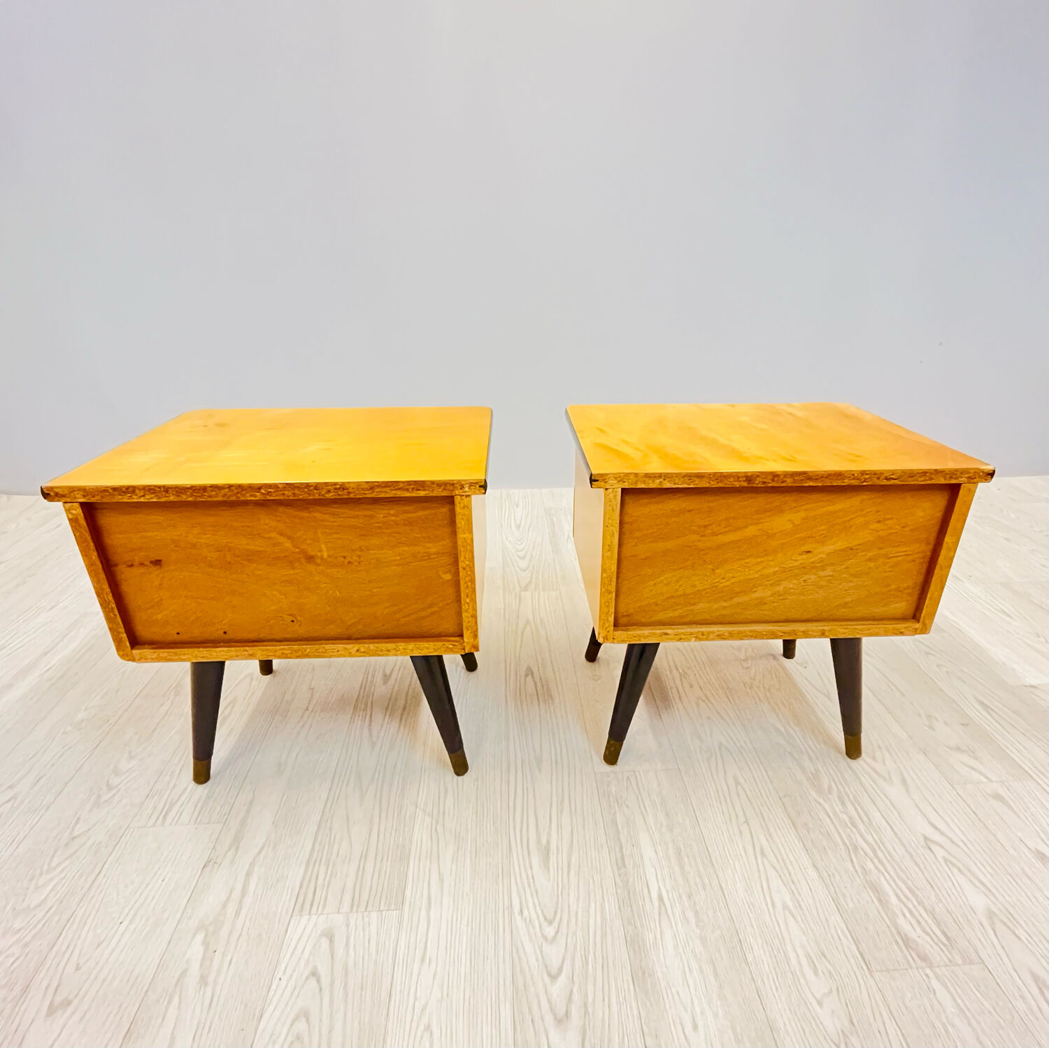 A pair of night cabinets