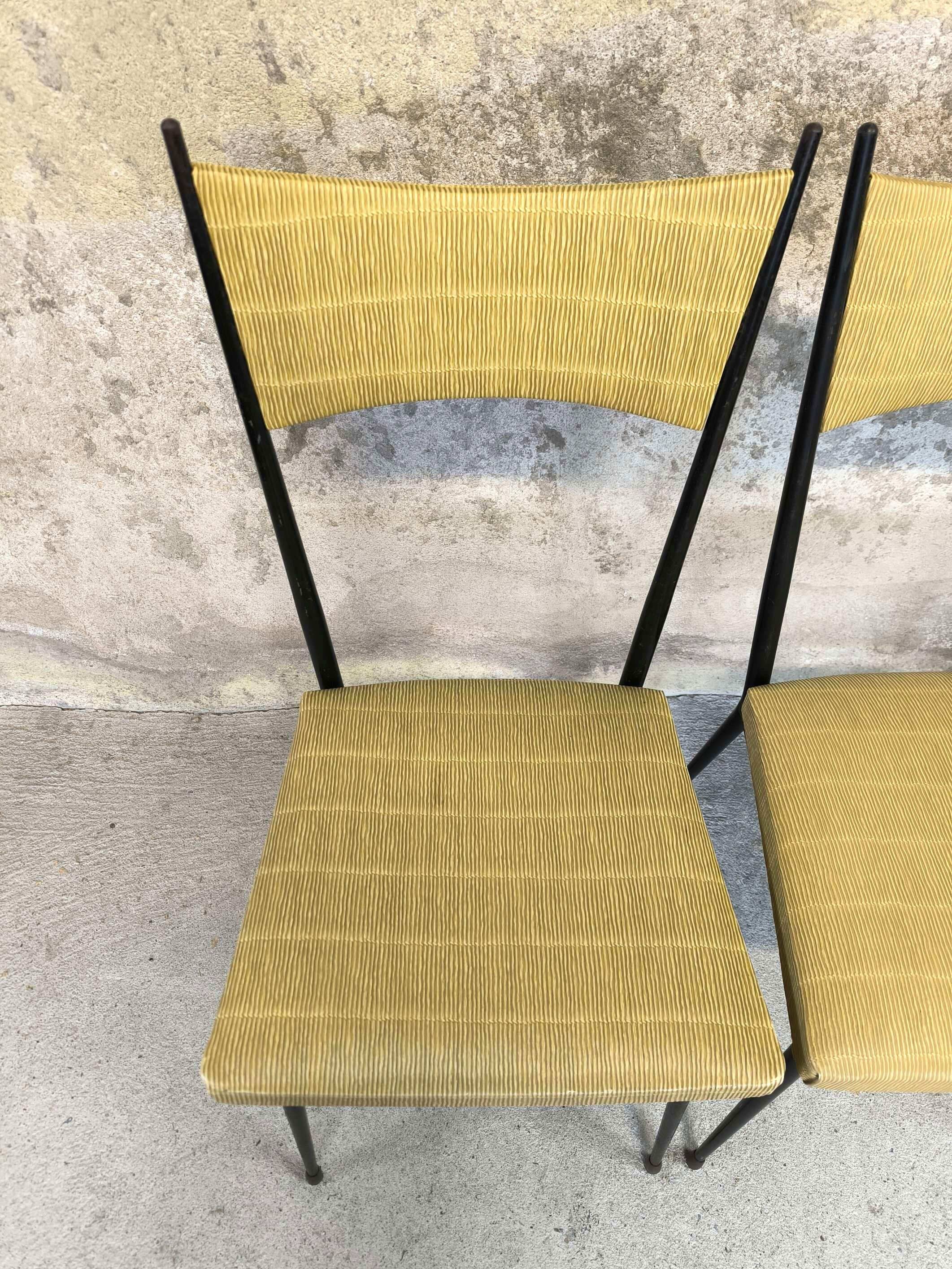 Three vintage chairs in the style of Colette Gueden.