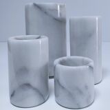 Four white marble candlesticks with black veins, 70s design