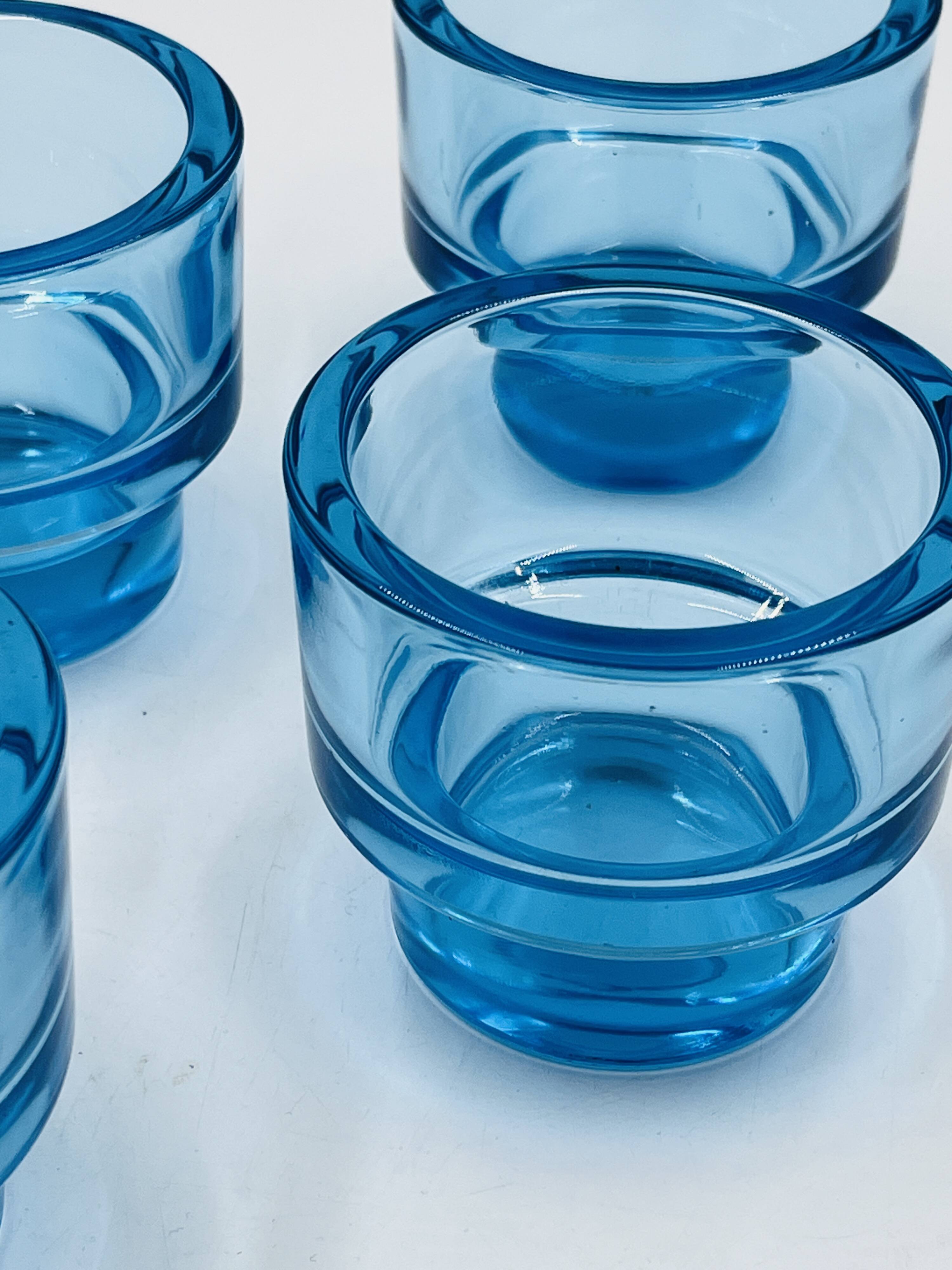 Set of 4 IKEA turquoise aquamarine glass candle holders.