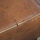 Sheepskin ottoman with a light brown colour scheme and a vintage look
