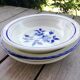 Trio of hollow dishes blue tones