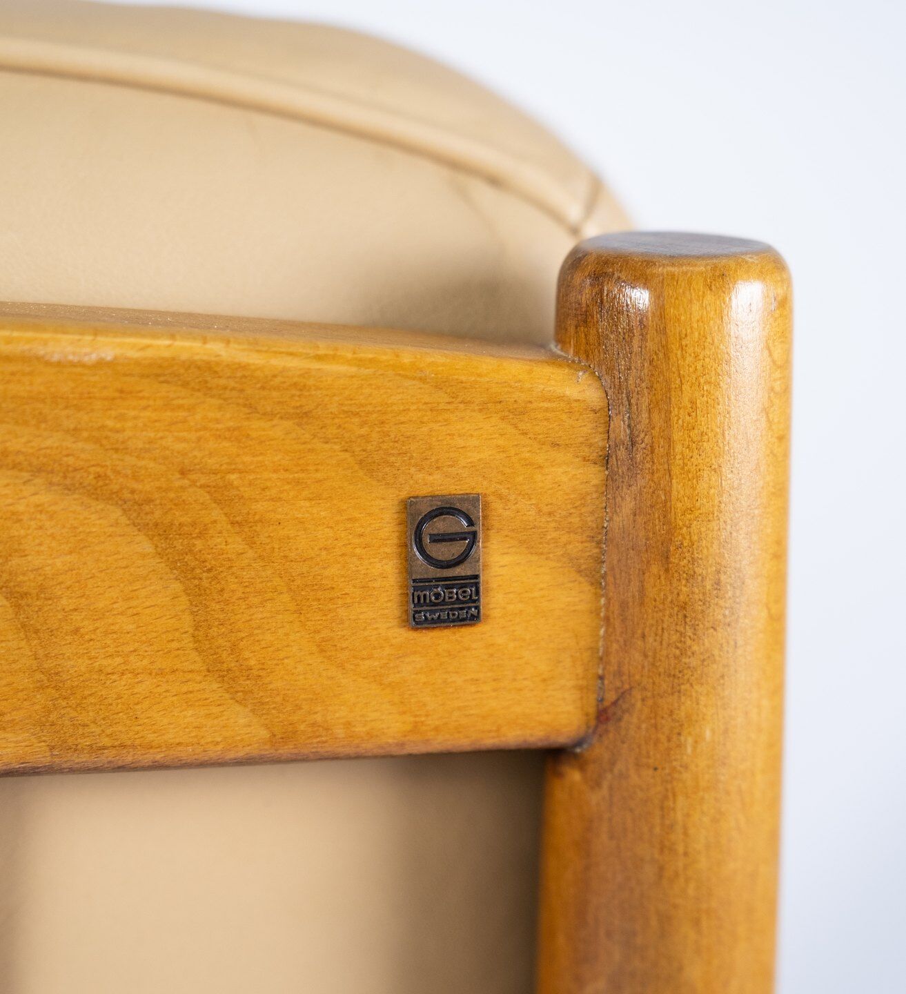 Armchair in dark wood and upholstered with light elegance leather of danish design, 1960s