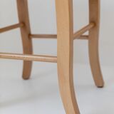 Lot of 2 vintage wooden stools from the 1980s, with hand-woven straw seats.