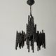 Three-armed suspended lamp in wrought iron, brutalist design, 1960s, Italy.