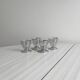 Set of 4 designer egg cups in shiny silver metal